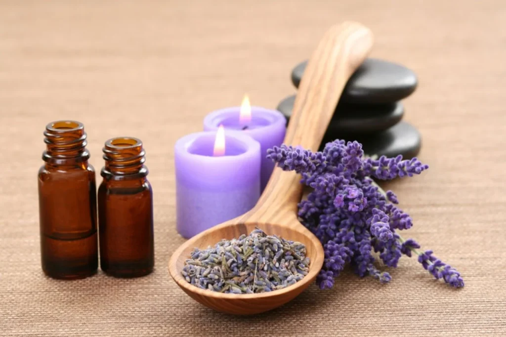 A bottle of lavender essential oil surrounded by fresh lavender sprigs, symbolizing relaxation and natural healing.