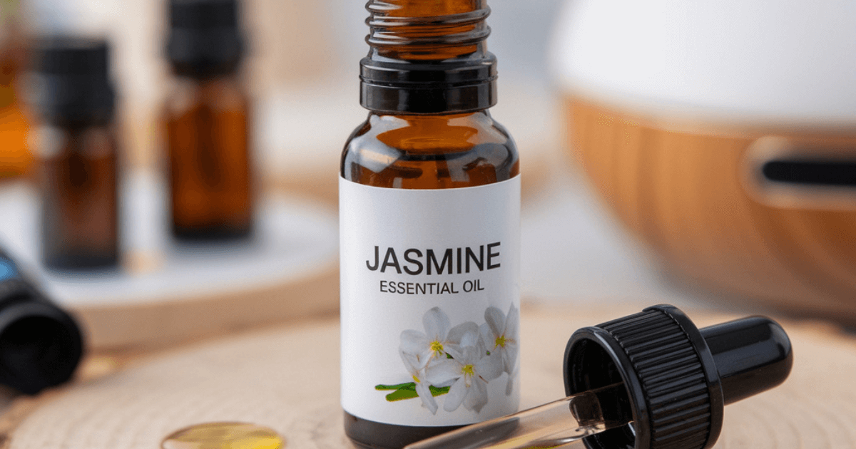 A bottle of jasmine essential oil surrounded by fresh jasmine flowers, promoting relaxation and skincare benefits.